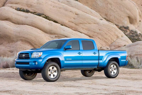 Fabtech 05-14 Toyota Tacoma 2WD/4WD 3in UCA System w/DL 2.5 Coilovers & Rear DL Resi Shocks