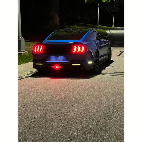 Blue Mustang at night